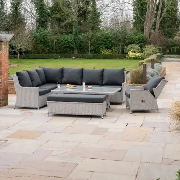 Talia L-Shaped Grande Rattan Dining Set with Reclining Armchair & Bench - Rising Table