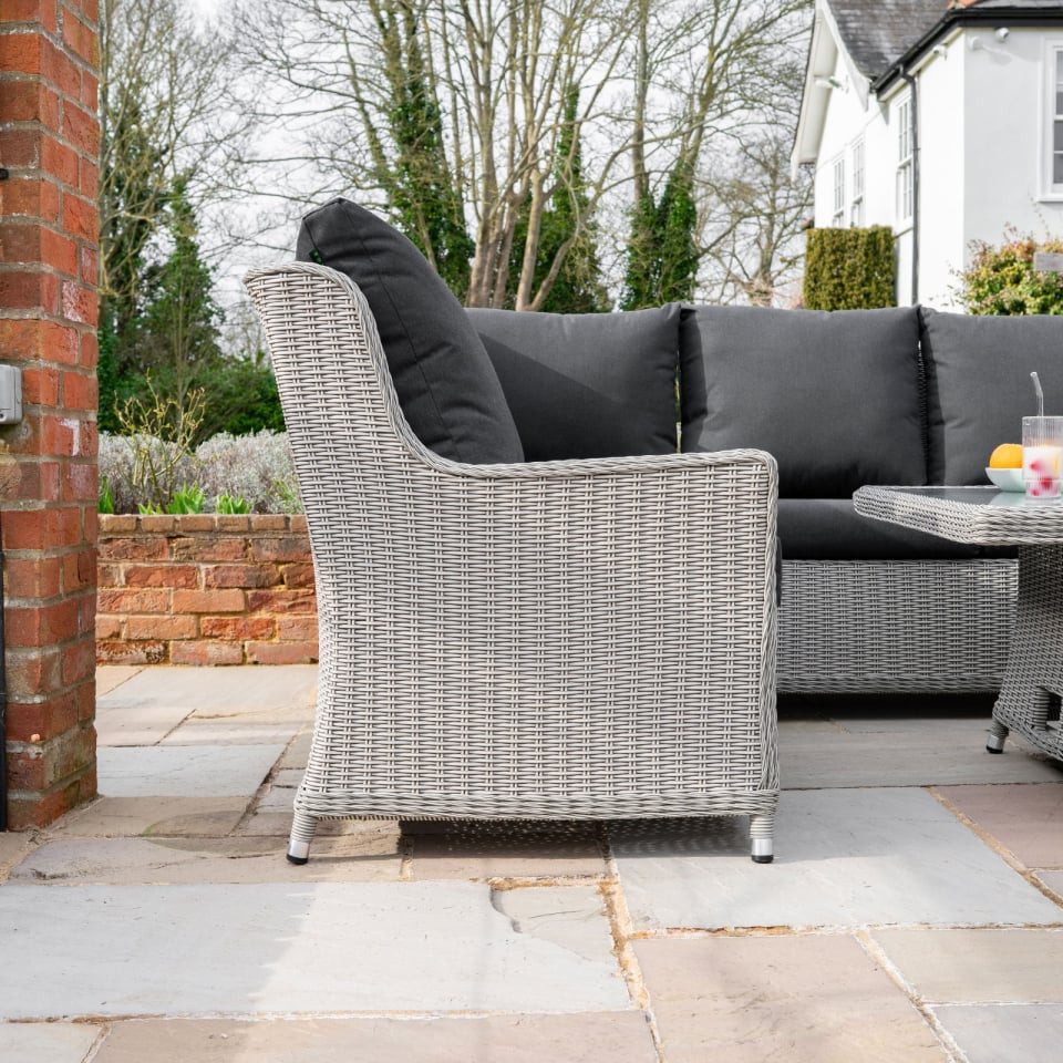 Talia L-Shaped Grande Rattan Dining Set with Reclining Armchair & Bench - Rising Table
