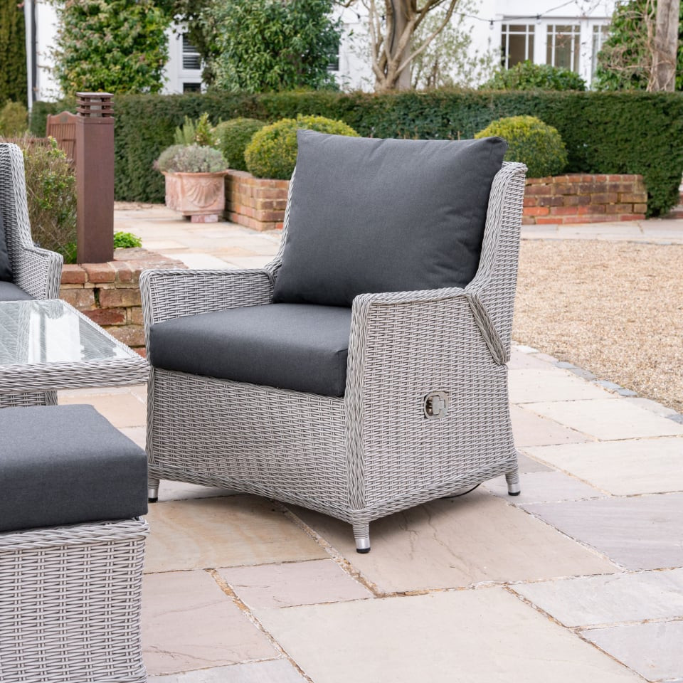 Talia L-Shaped Grande Rattan Dining Set with Reclining Armchair & Bench - Rising Table
