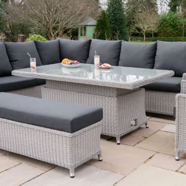 Talia L-Shaped Grande Rattan Dining Set with Reclining Armchair & Bench - Rising Table