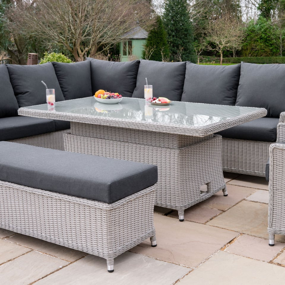 Talia L-Shaped Grande Rattan Dining Set with Reclining Armchair & Bench - Rising Table