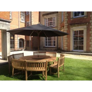 Chunky 210cm dia teak table with contour benches & parasol